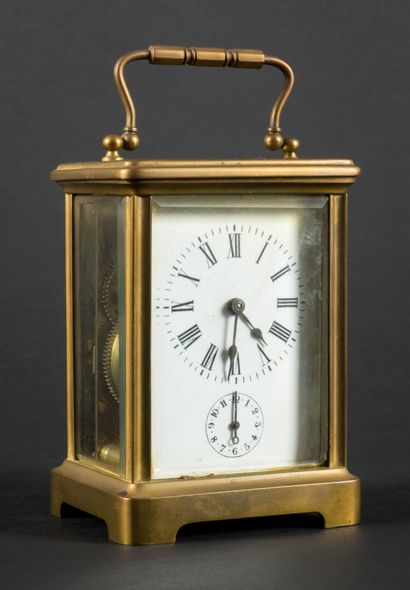 null Officer's clock, circa 1900.

Enamel dial with Arabic numerals, 

Brass case...
