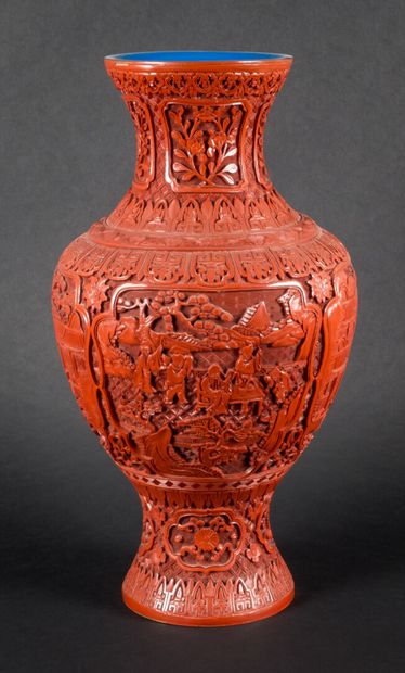 null Baluster vase in imitation of Cinnabar lacquer, richly decorated with scenes...