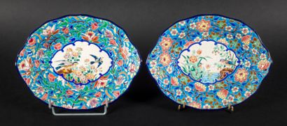 null LONGWY 

Two glazed earthenware bowls, decorated with birds.

28 x 22 cm