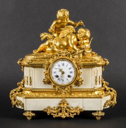 null Clock in white marble and gilt bronze.

The nap of the cherubs.

Louis XVI style,...