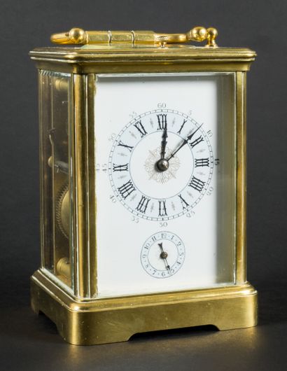 null Officer's alarm clock in brass, enamelled dial with Arabic and Roman numerals

19th...