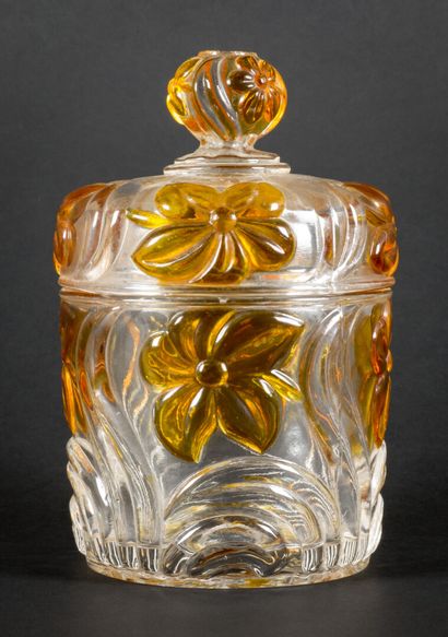 null SAINT LOUIS.

Covered pot out of translucent blown glass with twisted godrons...