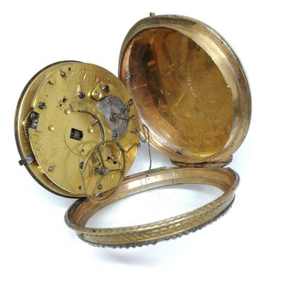 null 
Gilded metal, enamel and rhinestone pocket watch.




On the back cover, oval...