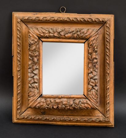 Small mirror in natural wood molded and carved...