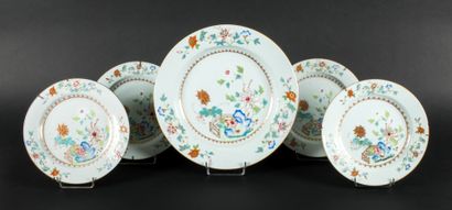 Series of four plates and a dish in polychrome...