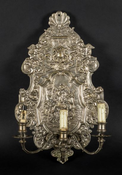 null Suite of four three-light sconces in silvered bronze decorated with divinities...