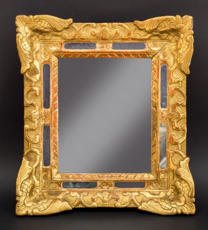 null Small rectangular mirror with glazing in carved and gilded wood with stylized...