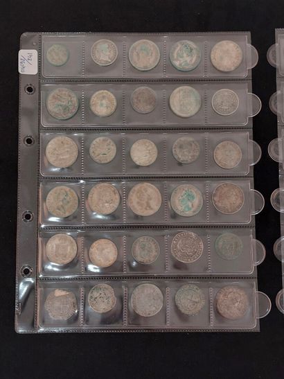 null Set of silver coins from different countries to study