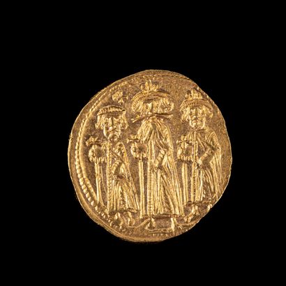 null HERACLIUS Solidus gold

A/ Heraclius with his sons - R/ Cross Potentiated Constantinople...