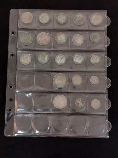 null Set of silver coins from different countries to study