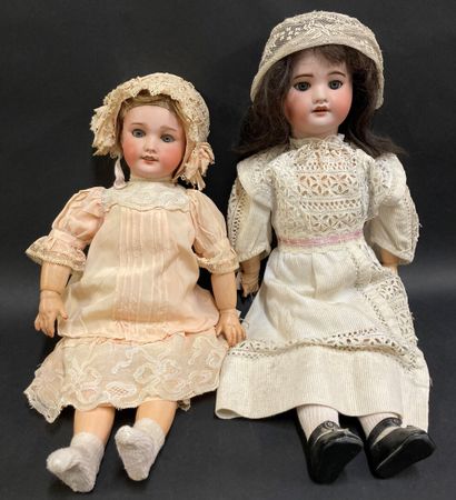 null Lot de deux poupées françaises de marque SFBJ :

- Moule 60, bouche ouverte,...