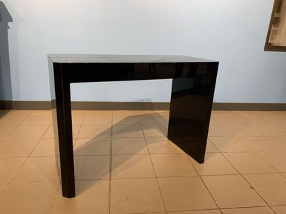 null Deploying console in black lacquered wood that can form a table thanks to a...