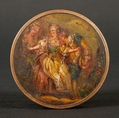 null 
Painted box with decoration of gallant scene, gold setting. It splits, discovering...
