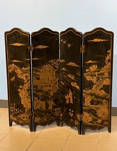 Four-leaf blackened and gilded wood screen,...
