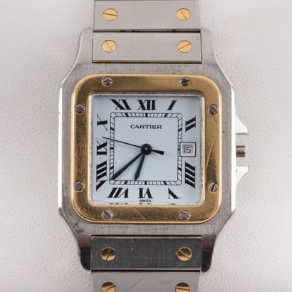 null CARTIER, Santos
Montre d'homme, boitier acier et or, 28 x 30 mm, mouvement automatique.
Remontoir...