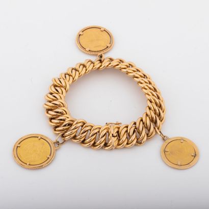 null Bracelet in 18K gold, decorated with coins in tassel, including 20 Fr Napoleon...