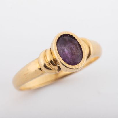 null Bague Jonc, améthyste en serti clos, monture or 18K
Poids brut : 3.6 g -Doigt:...