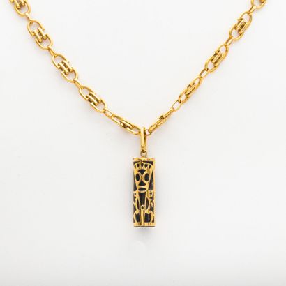 null Fancy gold necklace, finished with a polynesian tiki, 18K gold setting 
Gross...