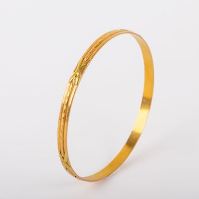 * 18 K gold engraved semi-circle bracelet...