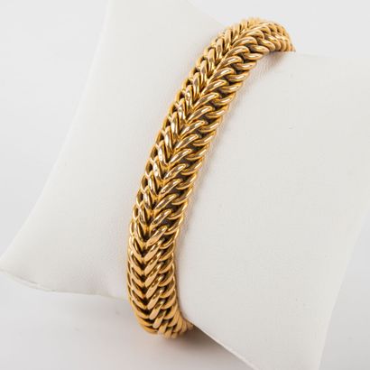American mesh bracelet 18K gold. 
About 1960...