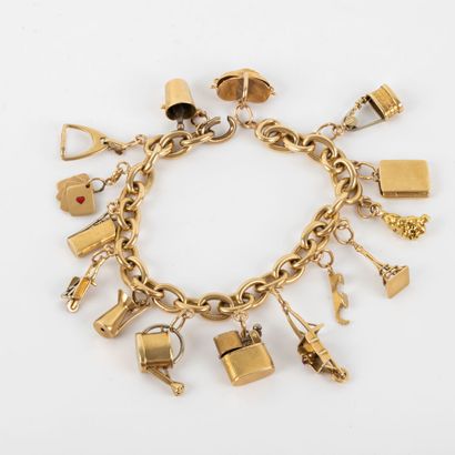 Bracelet and charms in 18K gold and stones
Gross...