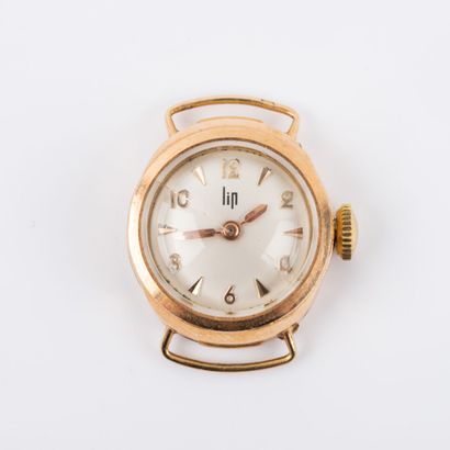 LIP 
18 K gold watch case; mechanical movement...
