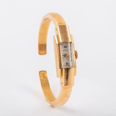 REX
Lady's watch, 18K gold case and bracelet,...