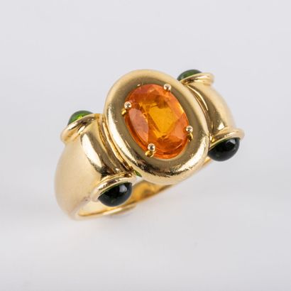 null KORLOFF
Wedding band ring, cabochon orange and green stones, 18 K gold setting...