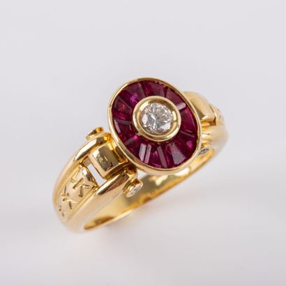 null KORLOFF 
Band ring, central brilliant-cut diamond, calibrated ruby surround,...