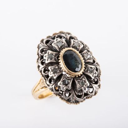 null Daisy ring, central closed-set sapphire, surrounded by rose-cut diamonds, set...