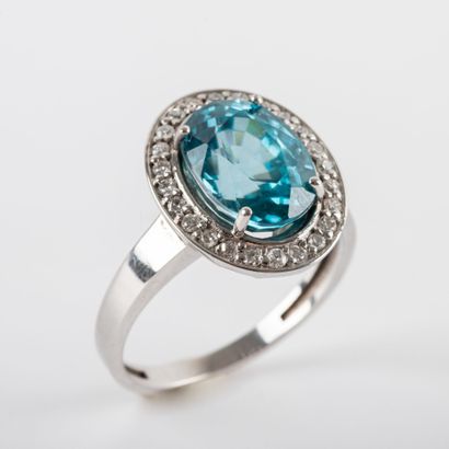 Daisy ring, blue stone, brilliant-cut diamond...