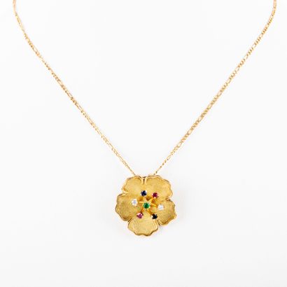 null Chaine pendentif "fleur", or amati 18K et pierres de couleur
Vers 1960
Poids...