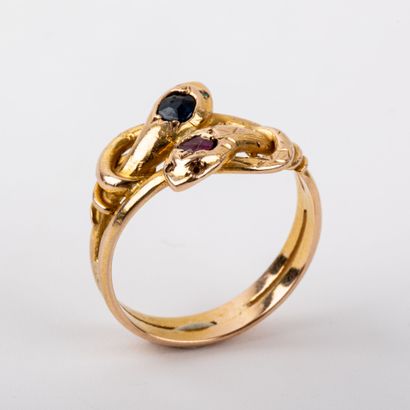 null Snake, ruby and sapphire ring set in 18K gold
Gross weight: 5.5 g. - Finger:...