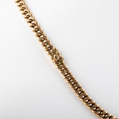 null Collier en chute or 18K, maille gourmette
Poids : 48,8 g.