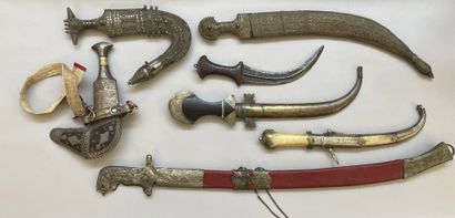 null Lot of various oriental bladed weapons with scabbards except for one. Provenance...