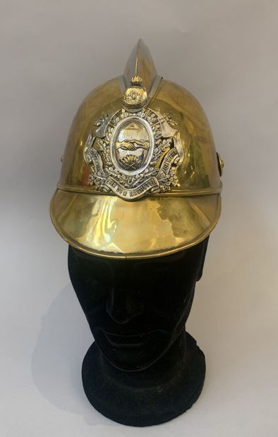 null German firefighter's helmet in brass, crest in a symmetrical, silver-plated...