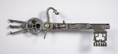 null Beautiful Gothic-style wrought-iron wick pistol with bassinet wick and downward...