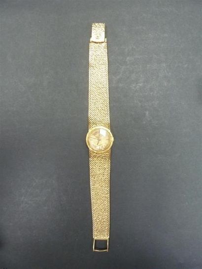 null OMEGA- montre de dame boitier et bracelet or, mouvement mécanique.
Vers 1960-70
Poids...