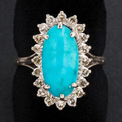 null Bague navette turquoise entourage de diamants taille 8/8, monture or gris. 
Poids...