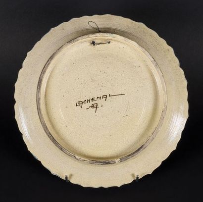 null LACHENAL (XIX-XXe) 
Grand plat creux polylobé en céramique à décor d'oeillets...