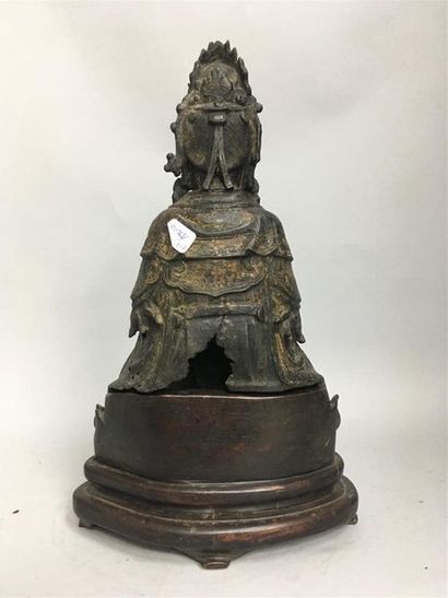 null Statuette Bouddha en bronze de patine brune anciennement laqué représentant...