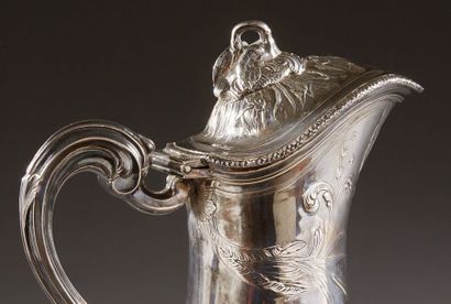 null PARIS 1784

Ewer and its silver basin, engraved with coats of arms and surmounted...