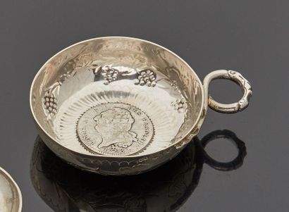 null Snake handle silver wine cup decorated with a decoration of bunches of grapes...