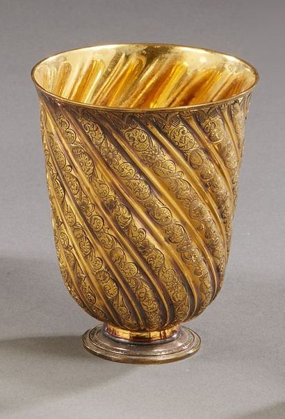 null PUIFORCAT



A cup on a vermeil pedestal, with twisted gadroons carved with...