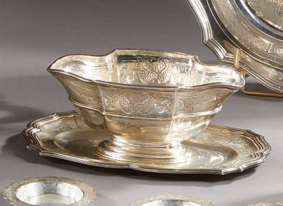 null CHRISTOFLE

Silver sauce boat model "Régence" with engraved decoration of leafed...