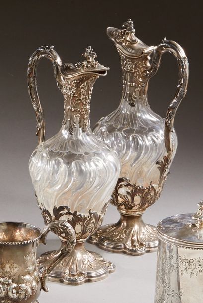 null Pair of crystal decanters molded and cut with twisted gadroons, rich silver...