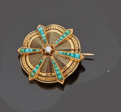 null Broche en or jaune 18 k (750 millièmes) de forme ondulée à décor de cercles...