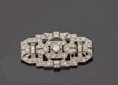 null Platinum brooch with geometric openwork decoration, set with old-cut diamonds,...