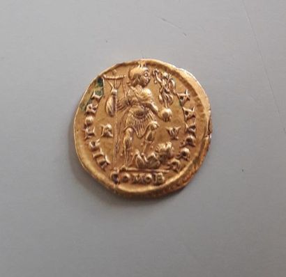 null Solidus or de l'empereur romain Honorius (393.423) 

Frappé a Ravenne. TTB

Diamètre...