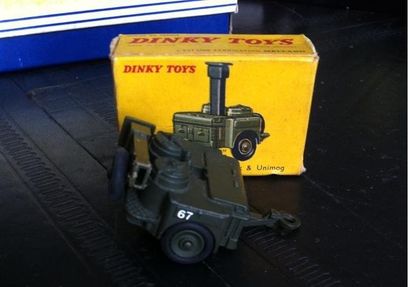 null DINKY TOYS

- 1 5-5 medium gun

- 1 Cuisine roulante (manque la cheminée de...